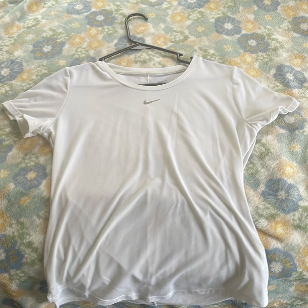 White Nike shirt